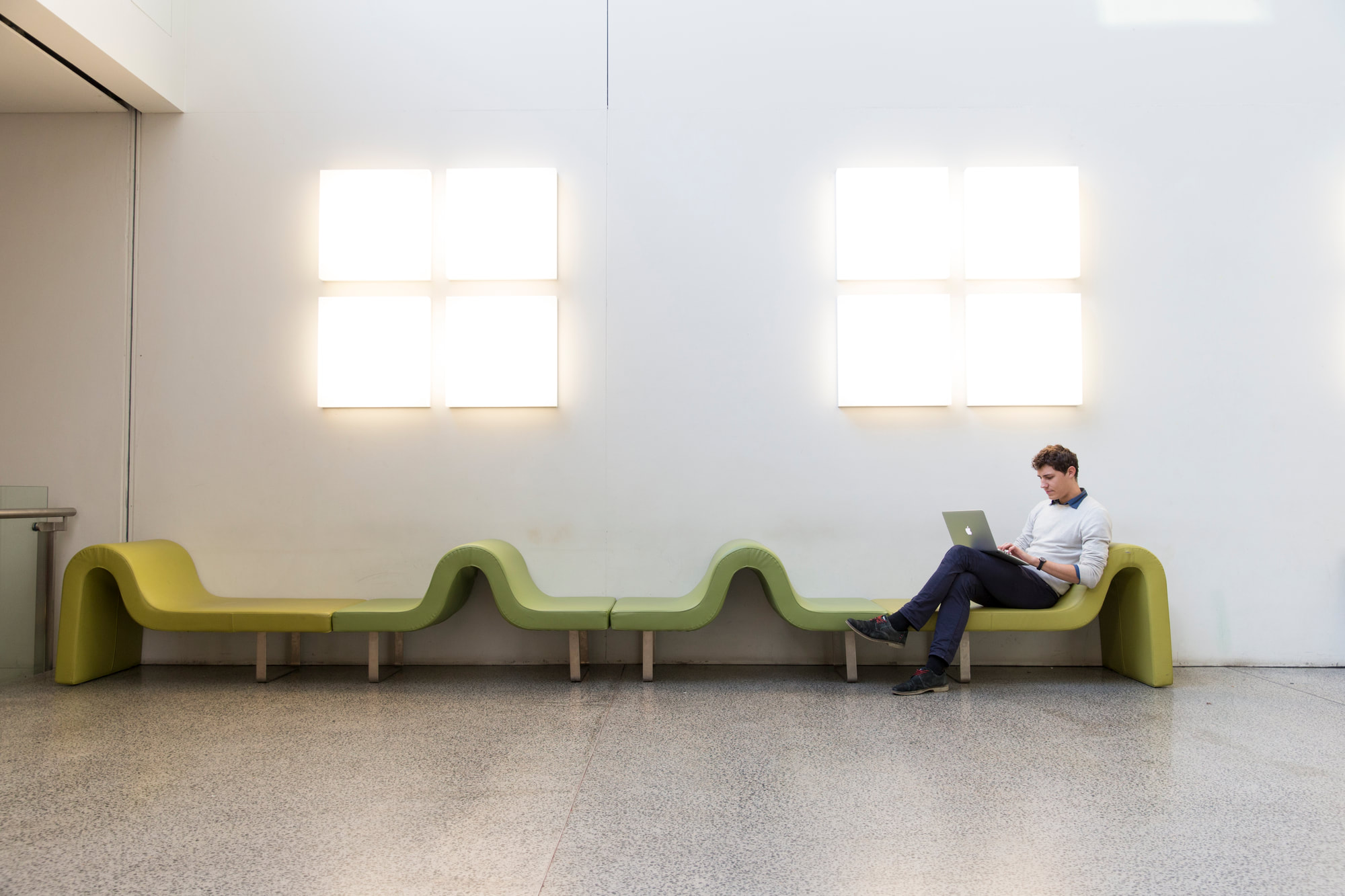 A student studying on campus